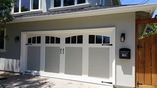 White garage door with glass panels.