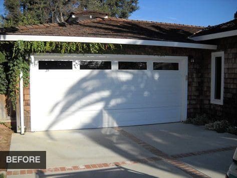 White garage door before renovation.