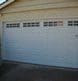 White garage door with windows.