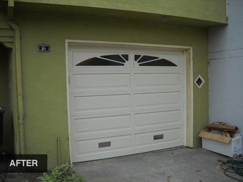 White garage door with glass panels.